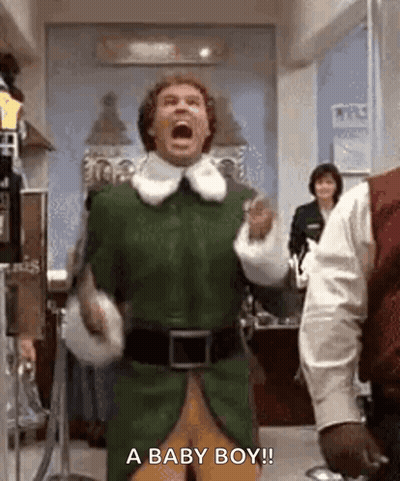 Man In Green Elf Costume Shouting Baby GIF