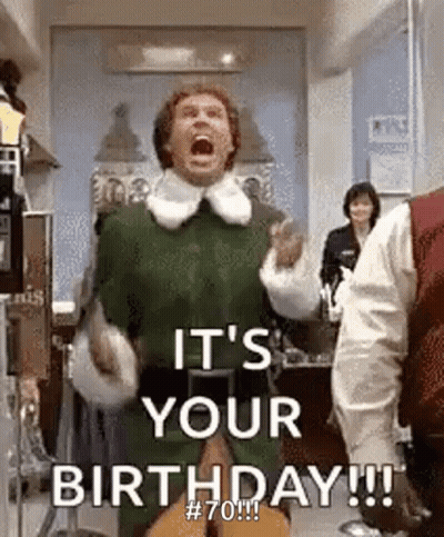 Man In Green Elf Costume Shouting It's Your Birthday GIF