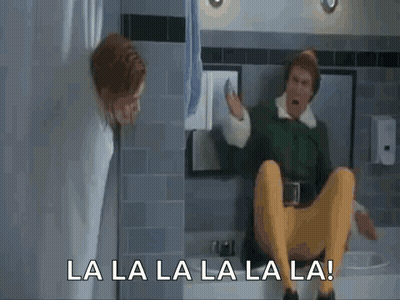 Man In Green Elf Costume Sitting On Toilet Singing GIF