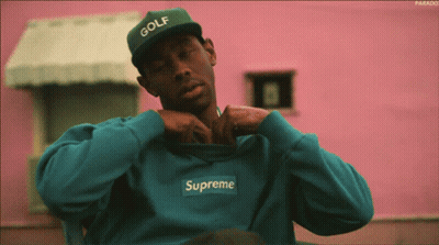 Man In Green Hat And Blue Supreme Sweatshirt GIF