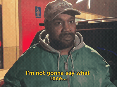 Man In Green Jacket And Hat Says I'm Not Gonna Say What Race GIF