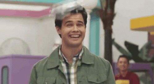 Man In Green Jacket And Plaid Shirt Laughing GIF