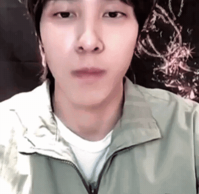 Man In Green Jacket And White Shirt GIF