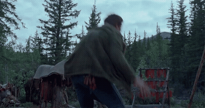 Man In Green Jacket In Forest GIF