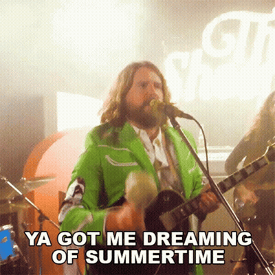 Man In Green Jacket Singing And Playing Guitar GIF