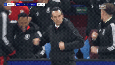 Man In Green Jacket Watching Soccer On Stan Sport GIF