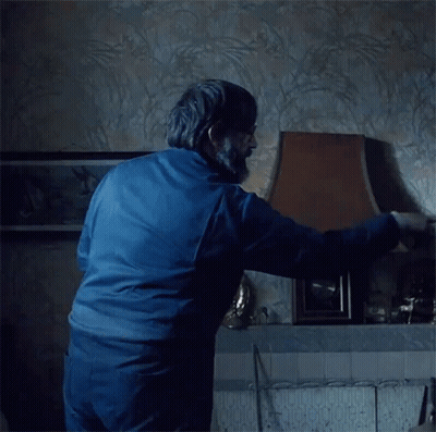 Man In Green Jacket With Fur Collar Says Too Bad It's Cold Darn It GIF