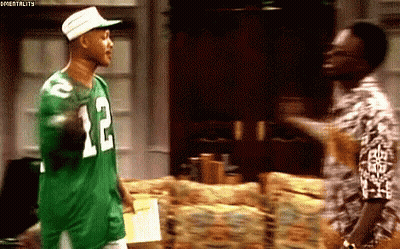 Man In Green Jersey Number 12 Talking GIF