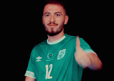 Man In Green Jersey Number 12 Thumbs Up GIF