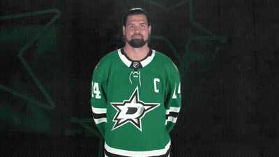 Man In Green Jersey With White Star And Letter R GIF