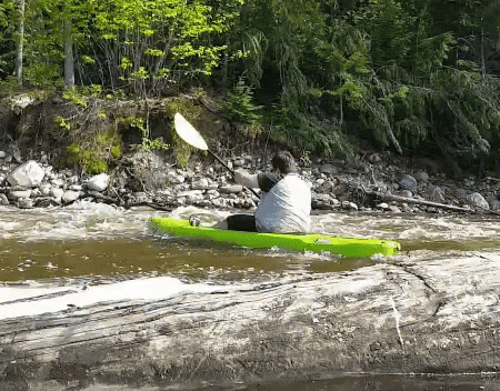 Man In Green Kayak With Paddle GIF
