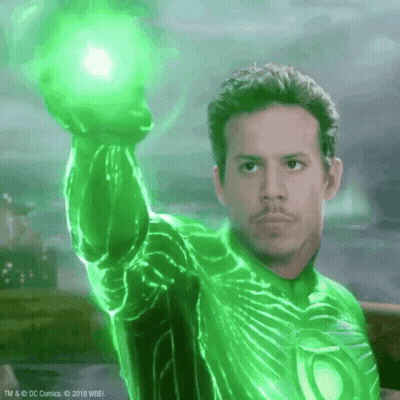 Man In Green Lantern Costume Holding Green Light GIF