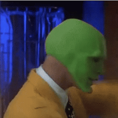 Man In Green Mask And Yellow Jacket GIF