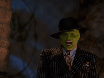 Man In Green Mask Blowing Smoke GIF