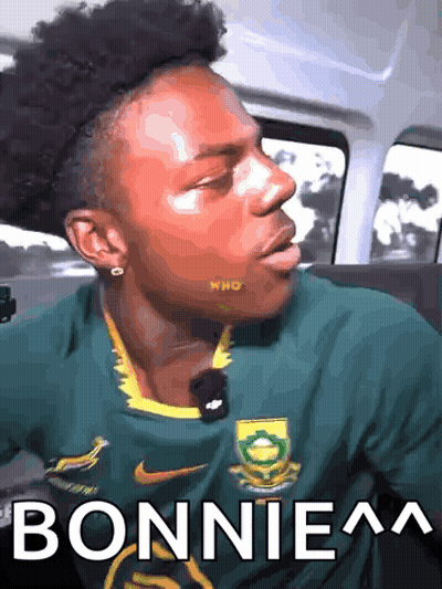 Man In Green Nike Shirt With Bonniea GIF