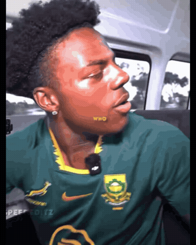 Man In Green Nike Shirt With Who On Cheek GIF