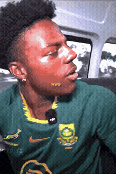 Man In Green Nike Shirt With Yellow Logo GIF