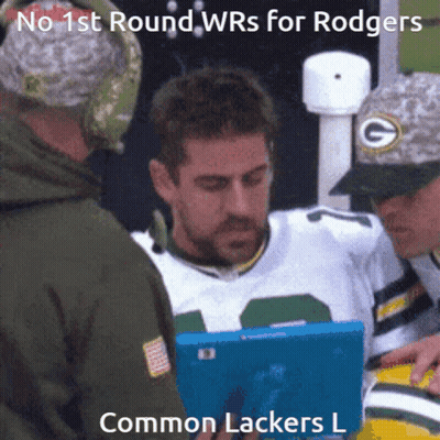 Man In Green Packers Jersey Being Interviewed GIF