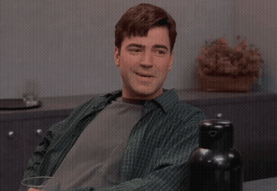 Man In Green Plaid Shirt Smiling GIF