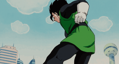 Man In Green Shirt And Black Pants In Front Of City GIF