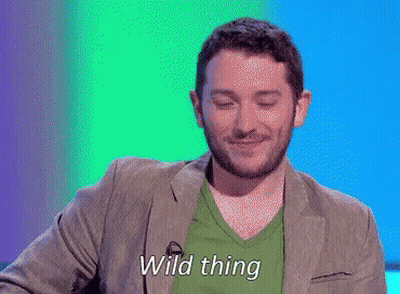 Man In Green Shirt And Jacket Saying Wild Thing GIF