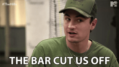 Man In Green Shirt And Sunlife Hat Says Bar Cut Us Off GIF