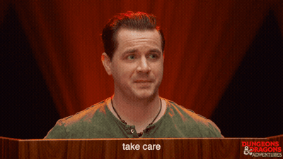 Man In Green Shirt Behind Podium Saying Dungeons & Dragons Adventures GIF