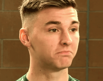 Man In Green Shirt Close Up GIF