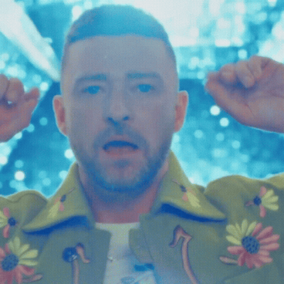 Man In Green Shirt Covering Ears GIF