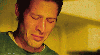 Man In Green Shirt Crying Eyes Closed Mouth Open GIF