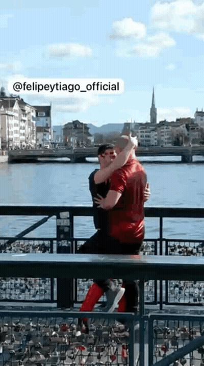 Man In Green Shirt Dancing With Another Man GIF