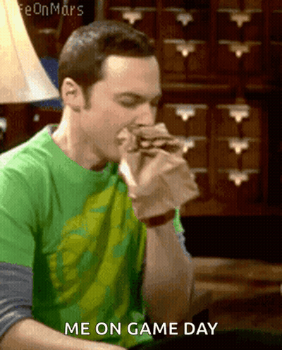 Man In Green Shirt Eating Sandwich Me On Game Day GIF
