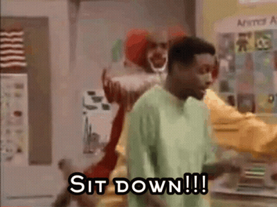 Man In Green Shirt Facing Clown GIF