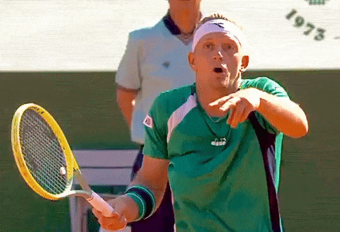 Man In Green Shirt Holding Tennis Racquet GIF