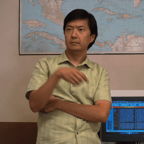 Man In Green Shirt In Front Of Computer Screen Athens Community College GIF