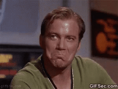 Man In Green Shirt Making Funny Face GIF