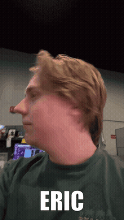 Man In Green Shirt Named Eric GIF