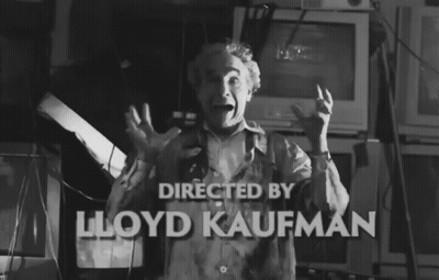 Man In Green Shirt Number 3 Dancing In Crowd GIF