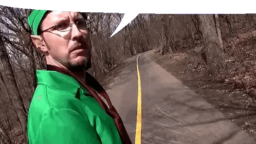 Man In Green Shirt On Road Sticker