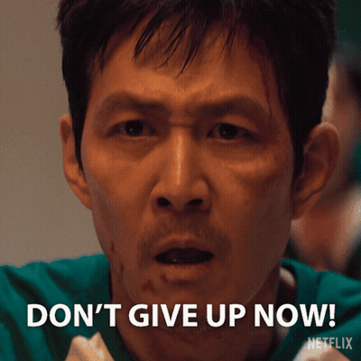 Man In Green Shirt Saying Don't Give Up Now GIF