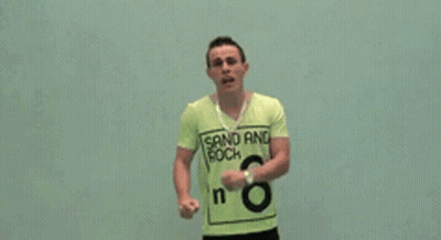 Man In Green Shirt Saying Grand And Rock GIF