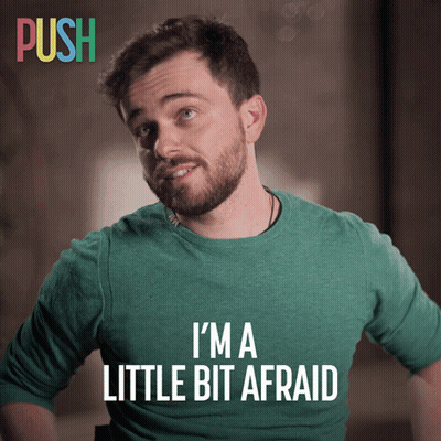 Man In Green Shirt Saying Im A Little Bit Afraid GIF