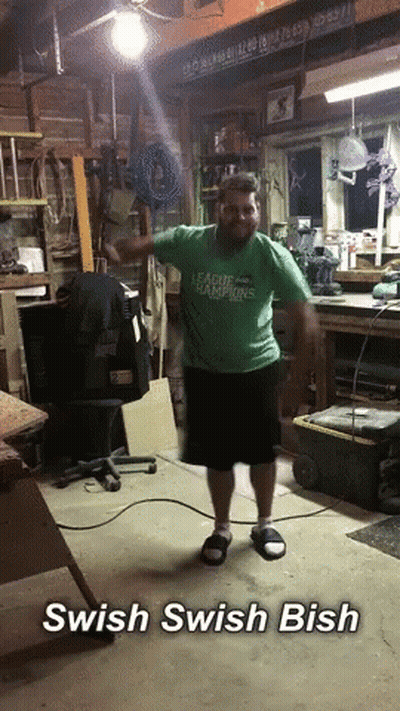 Man In Green Shirt Saying League Champions Dancing In Garage GIF