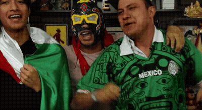 Man In Green Shirt Saying Mexico With Two Men GIF
