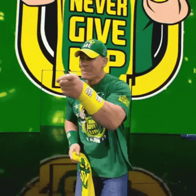 Man In Green Shirt Saying Never Give Up GIF