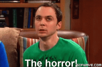 Man In Green Shirt Says The Horror GIF