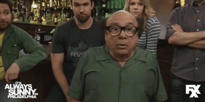 Man In Green Shirt Says Whoops To Crowd GIF