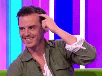 Man In Green Shirt Scratching Head GIF