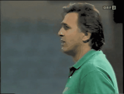 Man In Green Shirt Shushing Before TV Saying ORF 2 GIF