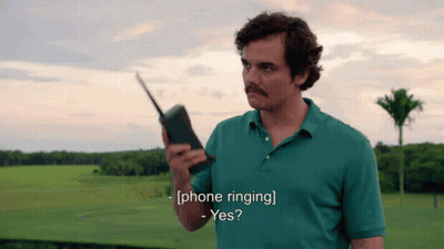 Man In Green Shirt Walkie Talkie Phone Ringing GIF